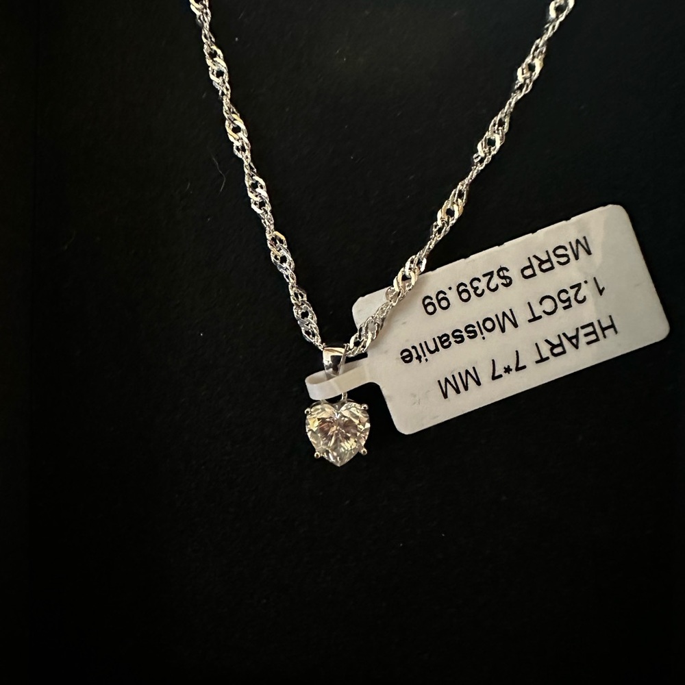 Moissanite Heart shape 1.25 ctw Sterling Silver.
